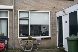 Huiskamer kozijn met draaikiep raam voorgevel woning Hazerswoude-Dorp